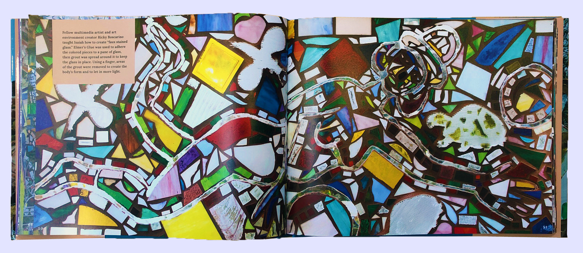 Open book with colorful mosaicked window