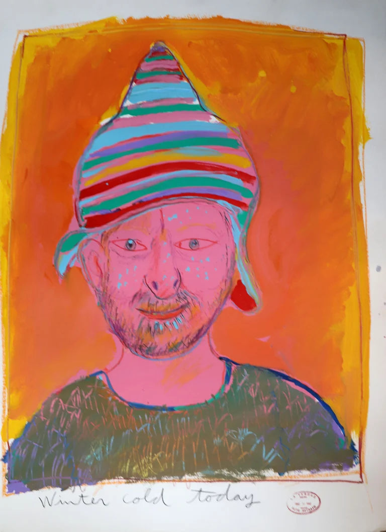 Colorful self portrait wearing a striped hat with an orange background.