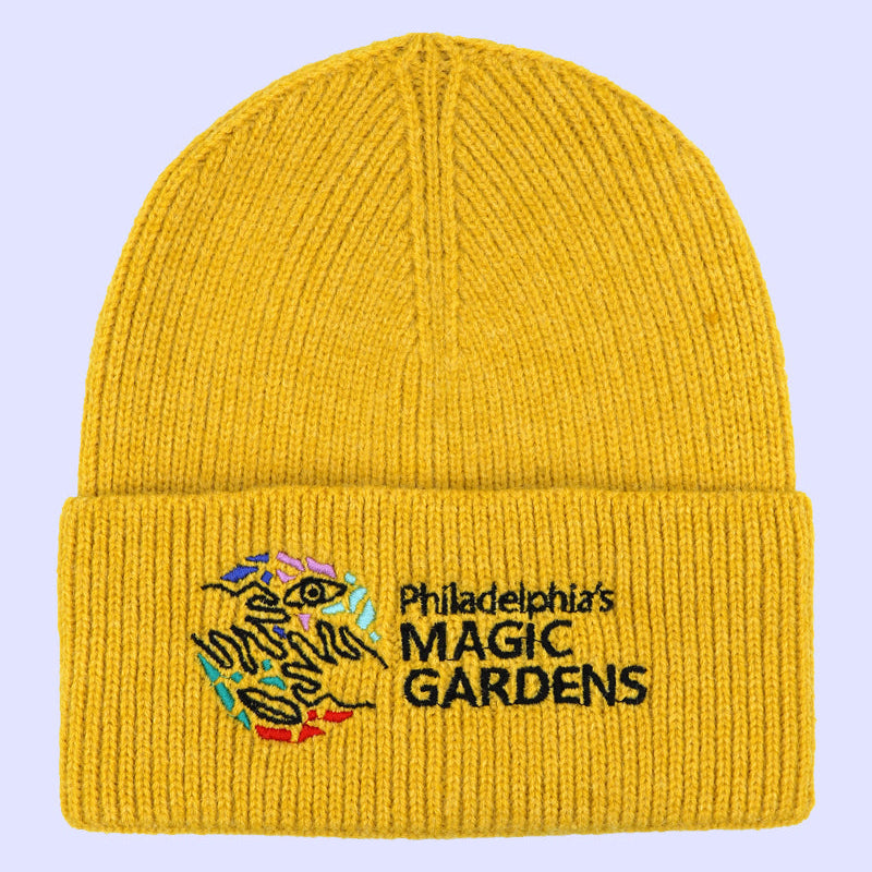 Yellow knit beanie with 'Philadelphia's Magic Gardens' embroidered logo.