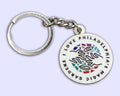 Enamel keychain (pendant measures 1.25"x1.25") featuring PMG's logo.