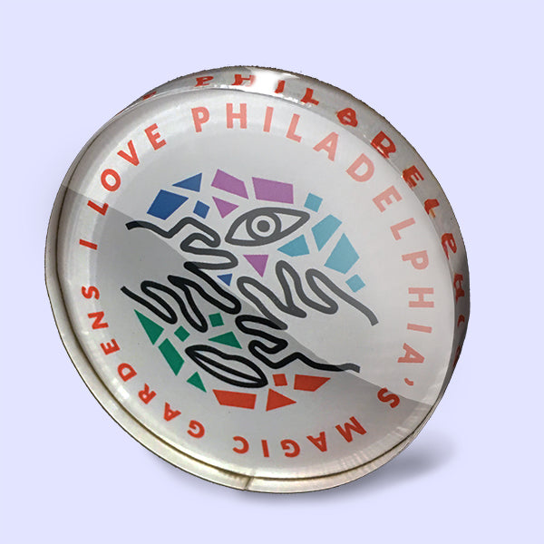 2.25" diameter acrylic refrigerator magnet featuring PMG logo and "I Love Philadelphia's Magic Gardens."