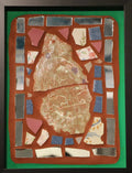 Framed mosaic with colorful tiles on orange grout with a green border.