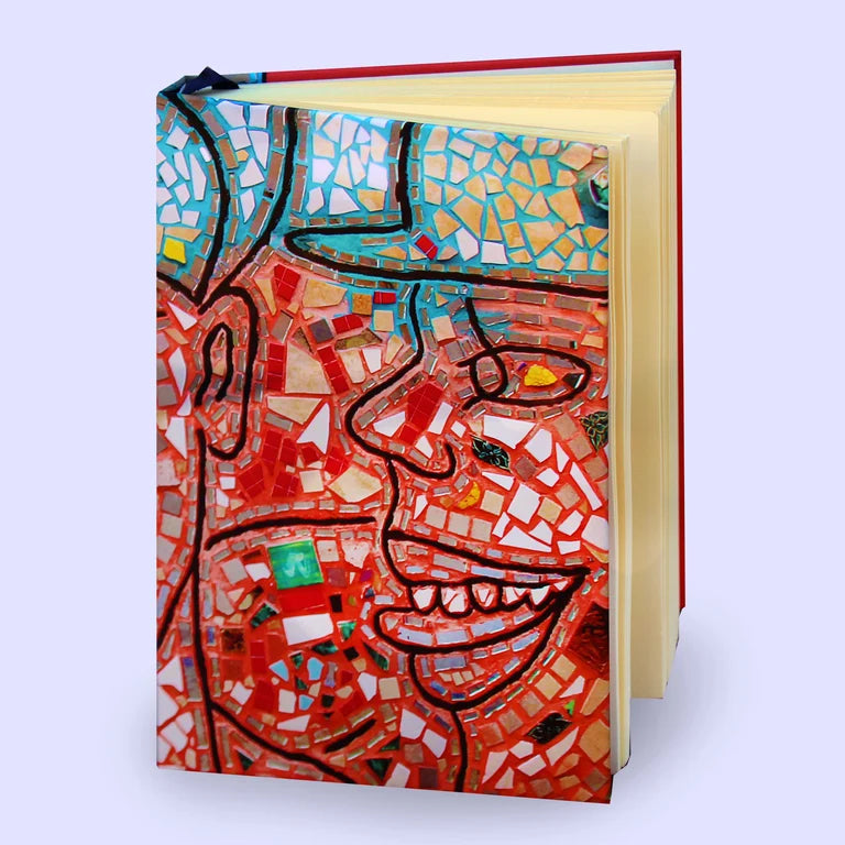 Colorful sketchbook with a mosaicked face on the cover. 