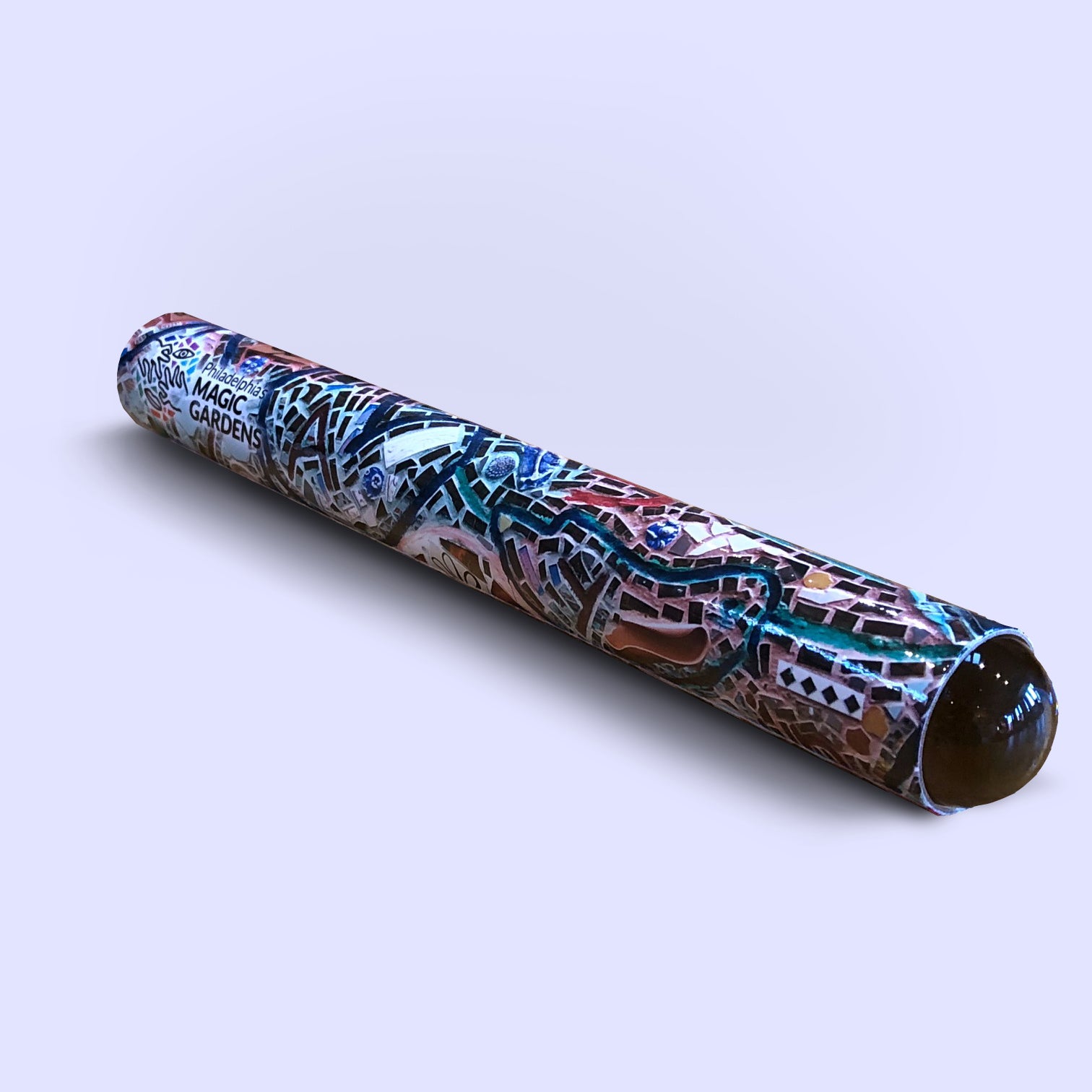 Colorful kaleidoscope tube with a mosaic pattern around it.