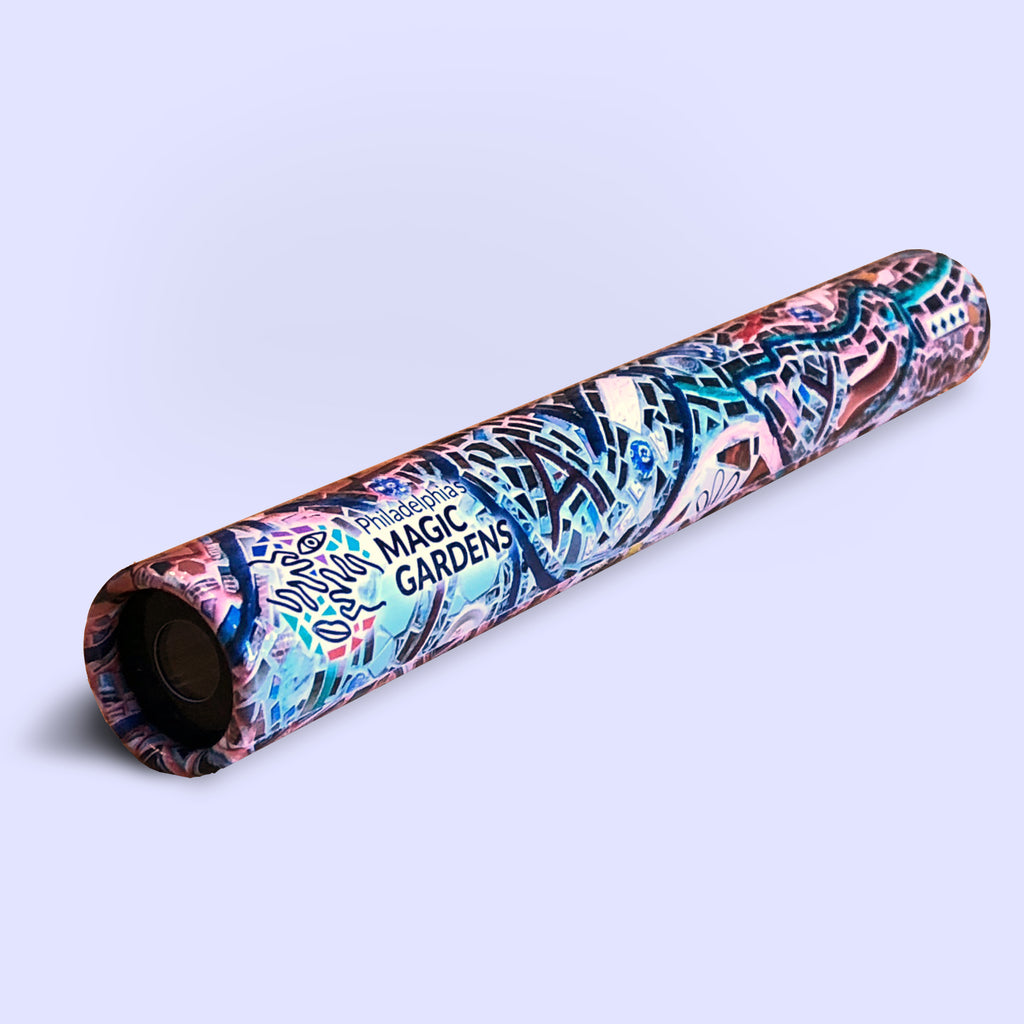 Colorful kaleidoscope tube with a mosaic pattern around it.